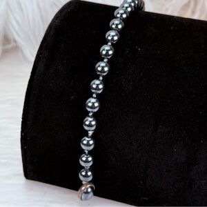 Beautiful vintage aged Silvertone weighted bracelet